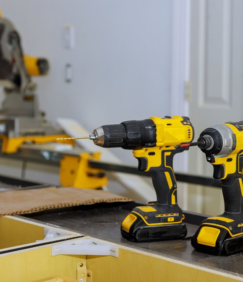 a man pulling on a broken part of a van